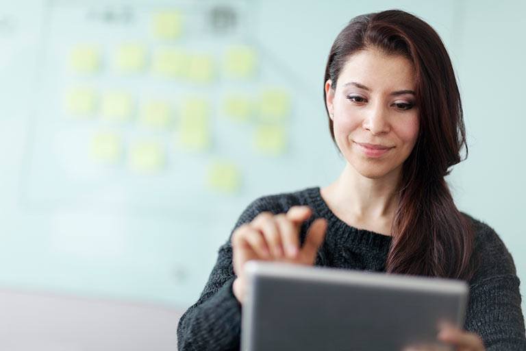 woman-working-on-a-tablet