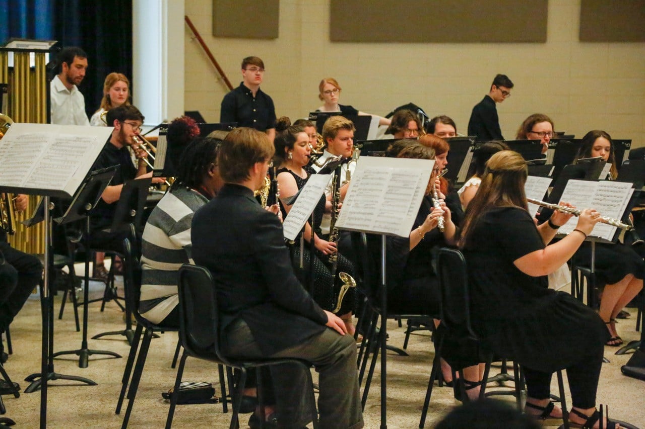 Picture of students participating in their band concert