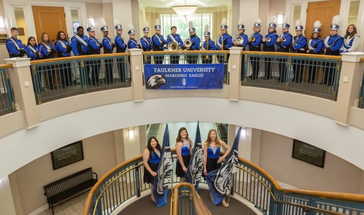 Faulkner University Band and Colorguard in the Business Building. 