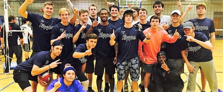 Members of Kappa Sigma Phi, one of Faulkner University's social clubs, posing for a picture after an intramural volleyball game
