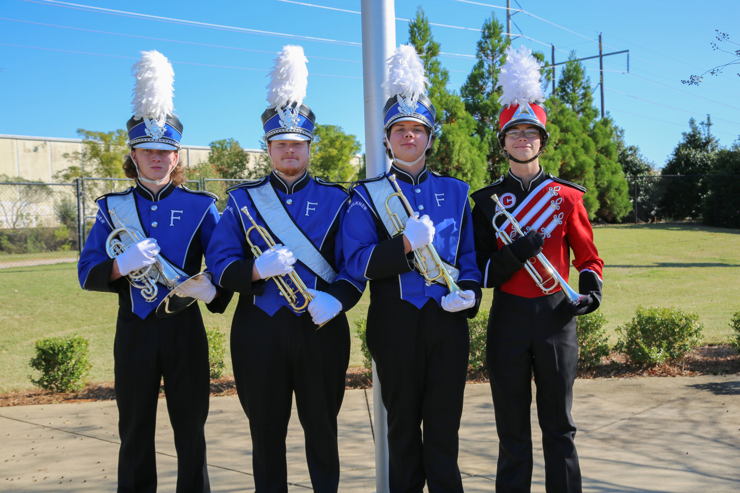 Four members of the Faulkner University Band.