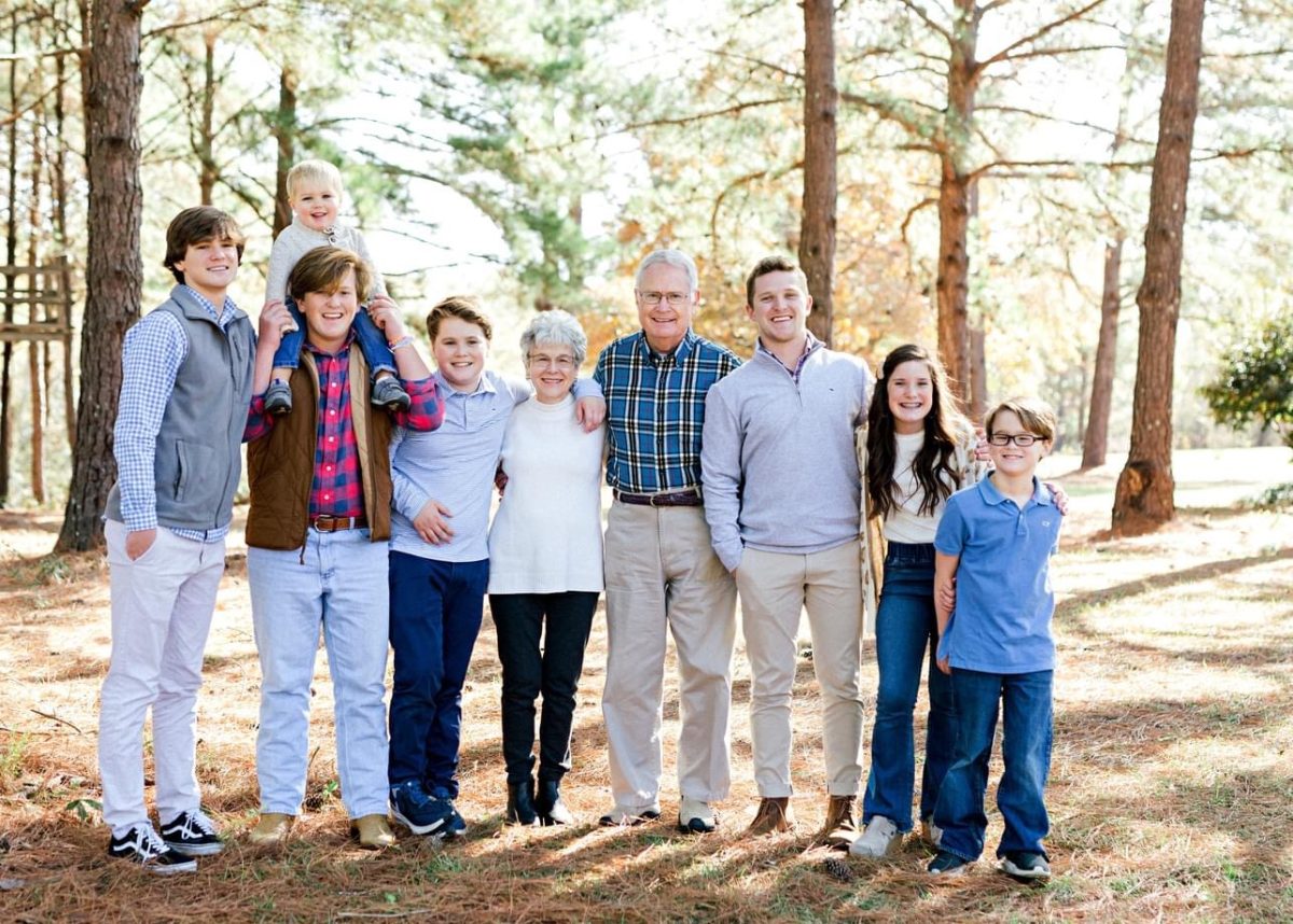 Ed Donahoo, center stands among his family.