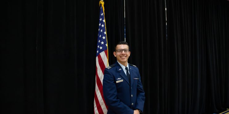 Michael Wooldridge stands by the United States flag